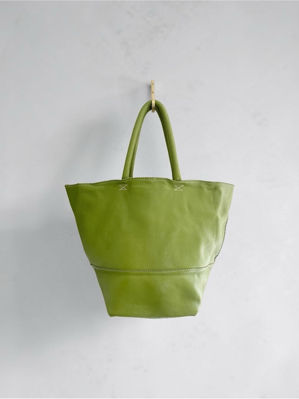 Crate & Barrel full grain leather tote bag in a vibrant moss lime green